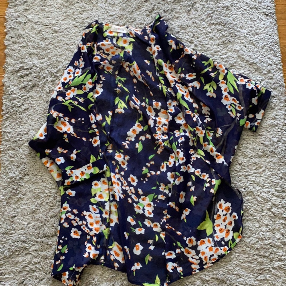 navy kimono with white and orange flowers and green leaves